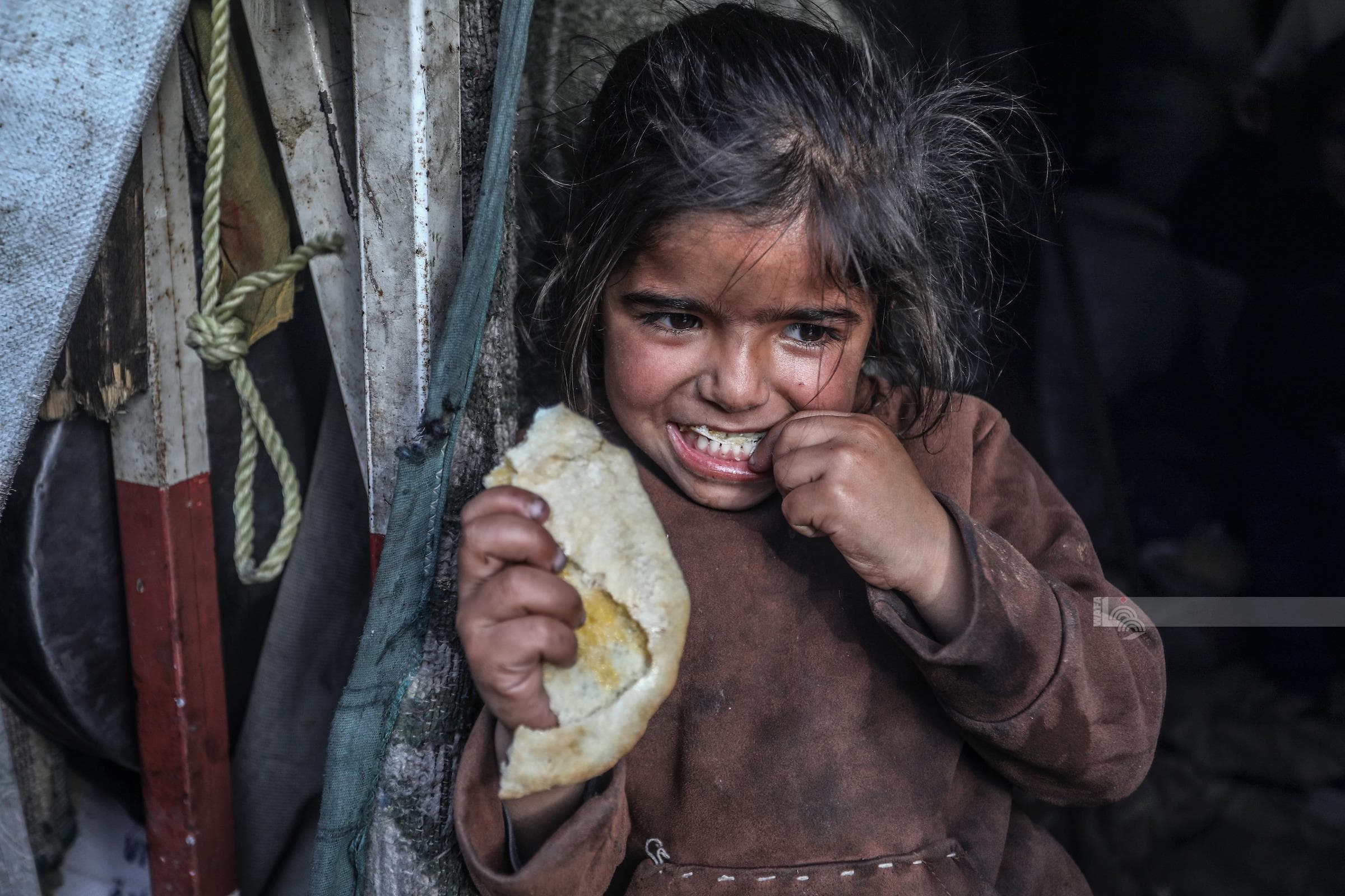 Volunteers sharing food with children in Gaza